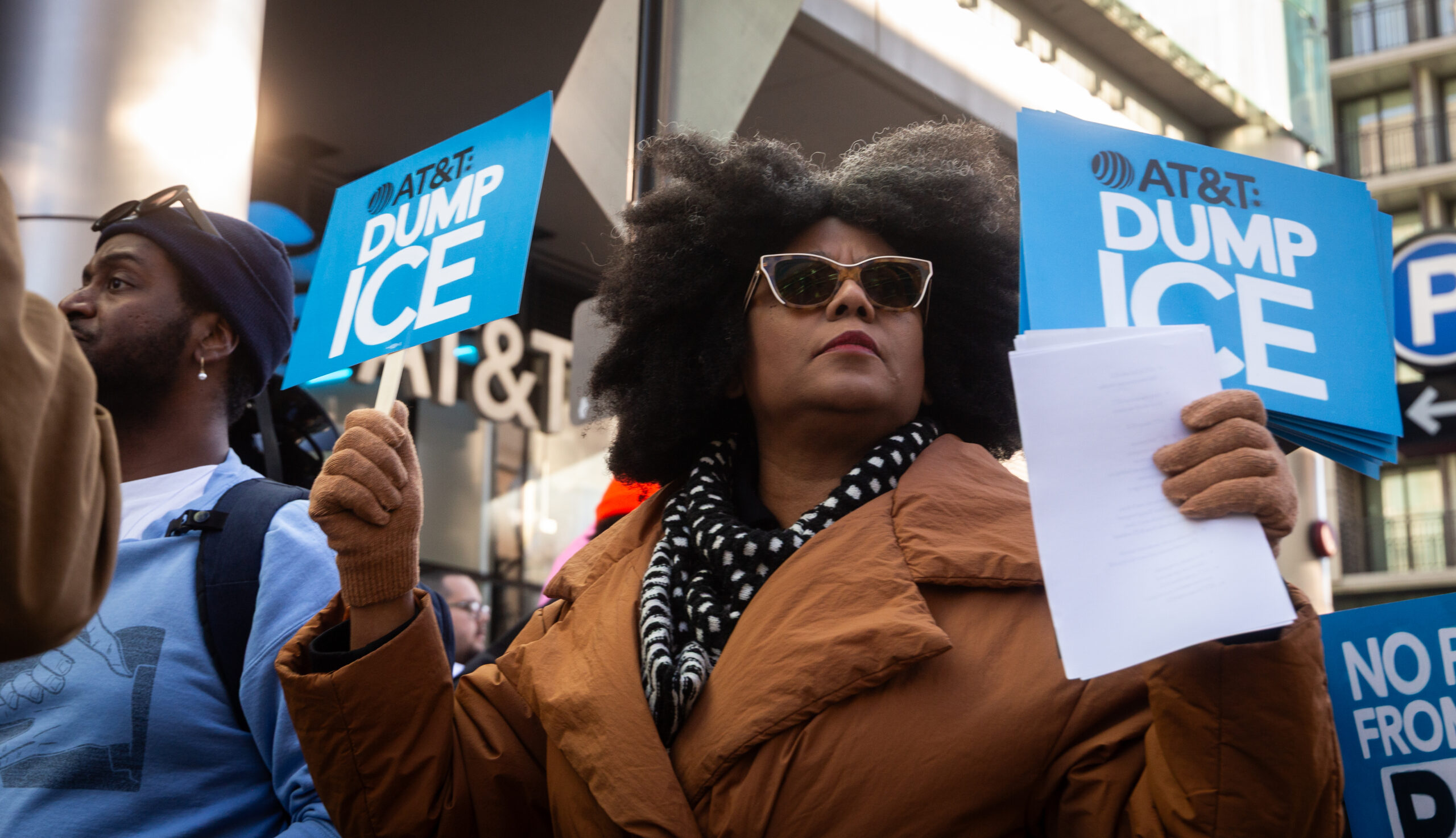 TPL members take action against AT&T due to their cooperation with ICE.